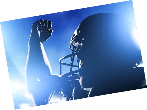 Silhueta de um jogador de futebol americano levantando um punho em celebração com iluminação dramática em azul